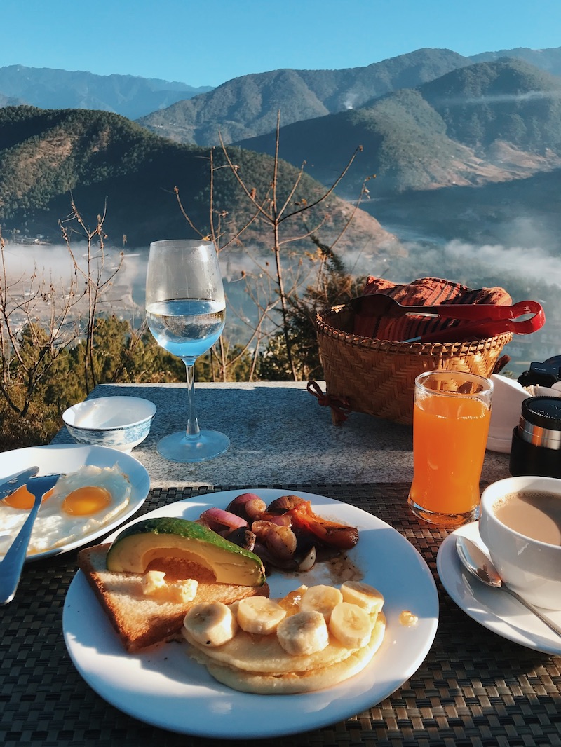 Nyilo breakfast with avocado and mountain view